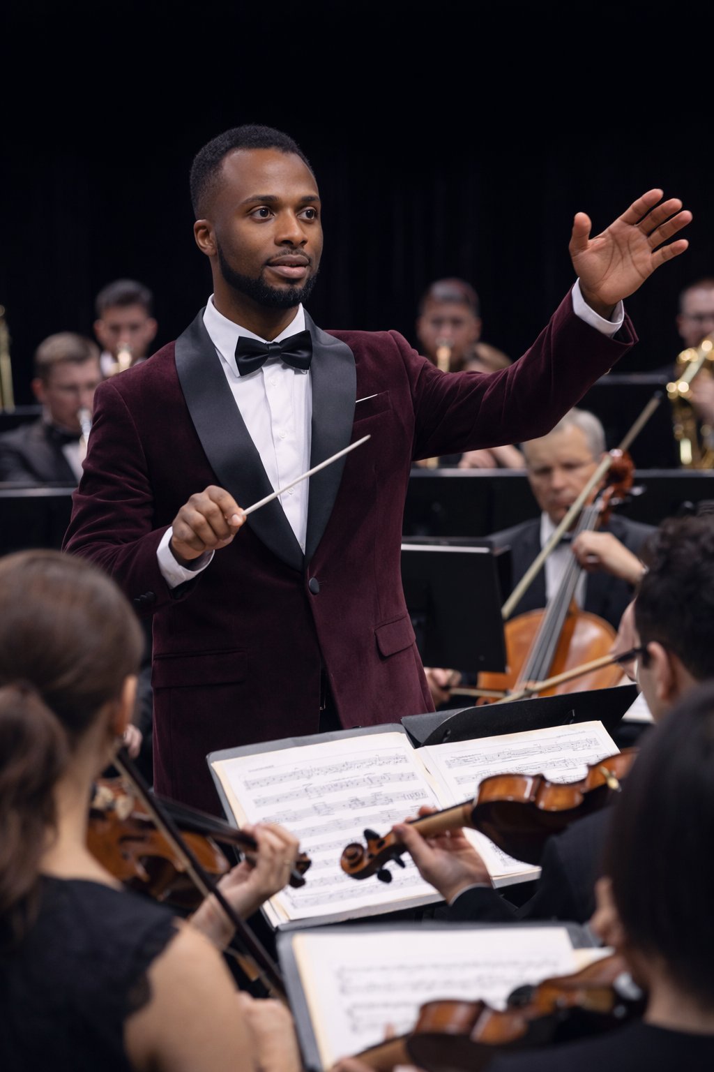 Pastor Caleb conducting an orchestra